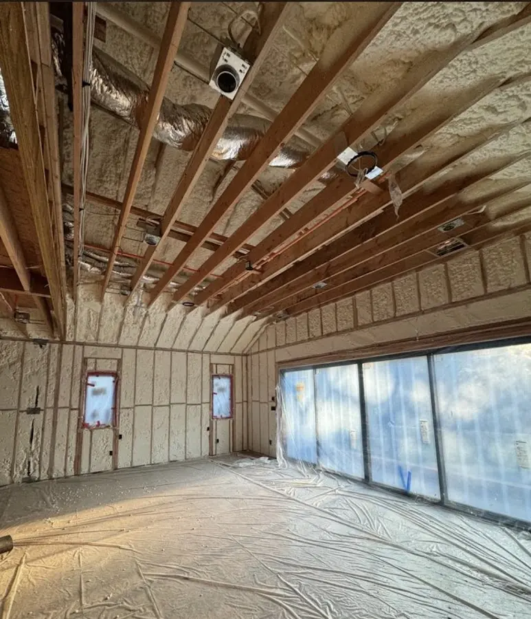 Interior walls and ceiling insulated with spray foam during new construction in Boulder Hill